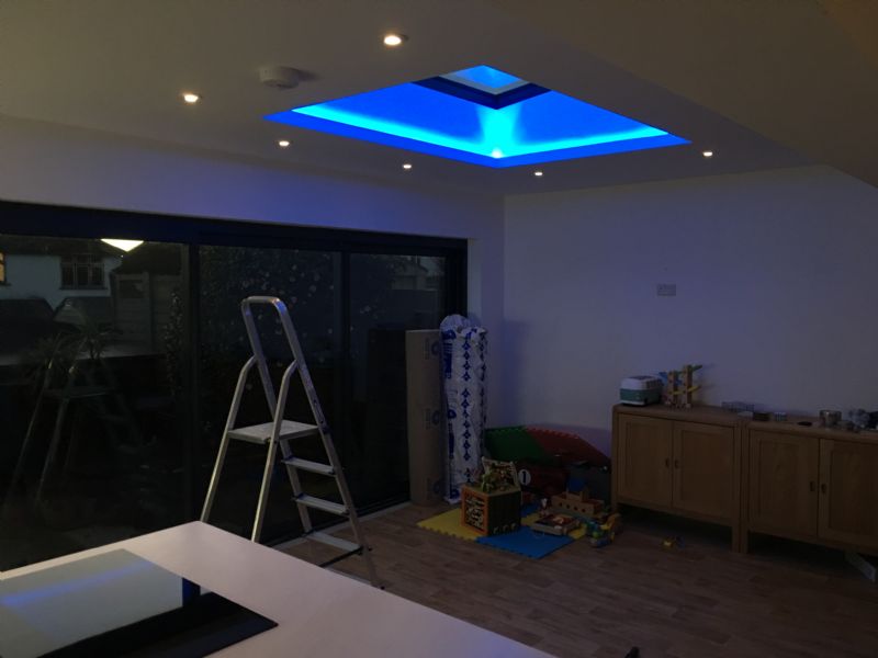 Colour-changing roof and soffit lighting at night