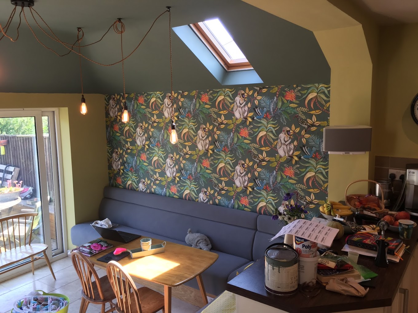 Pendant lighting over dining area